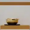 Bol à caviar en métal argenté, bol en cristal et socle en bois et finition vermeil de la collection Jacaranda de Puiforcat