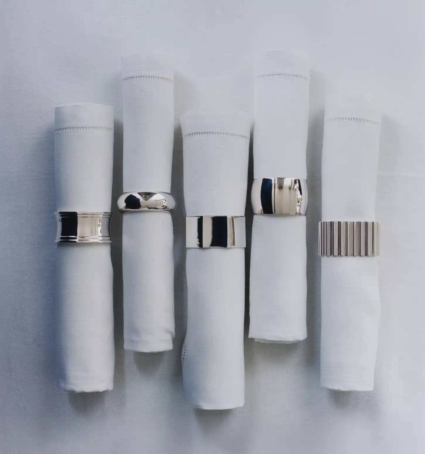 Coulants Puiforcat sur serviettes