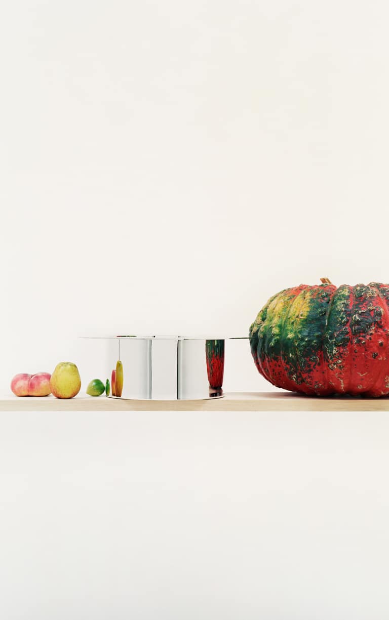 Dinner Service salad bowl set on a wooden shelf, dressed with vegetables