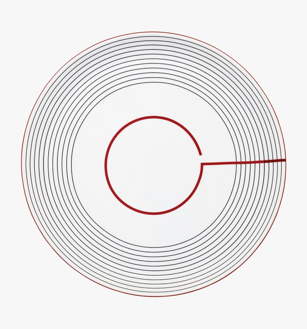 Porcelain flat round plate from Initiales collection from Puiforcat