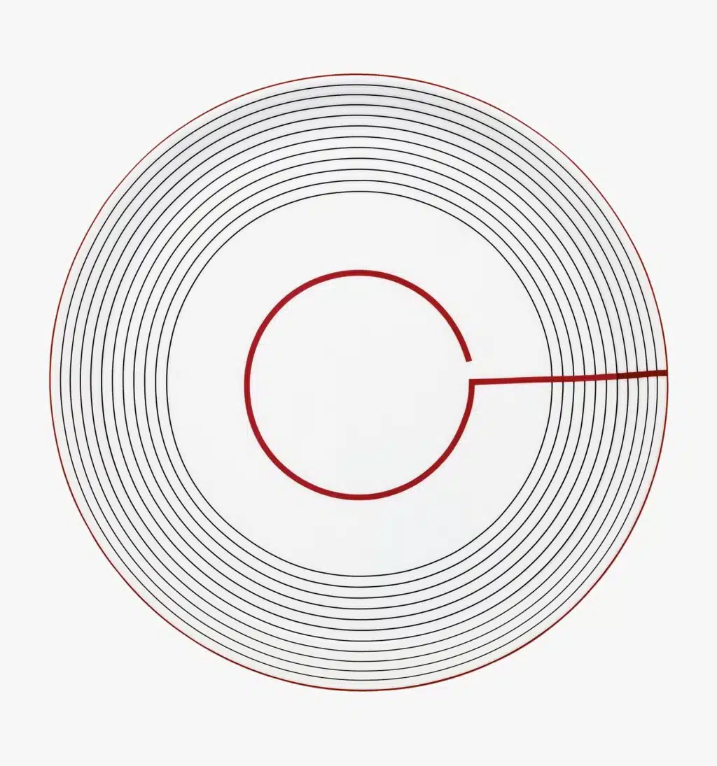 Porcelain flat round plate from Initiales collection from Puiforcat