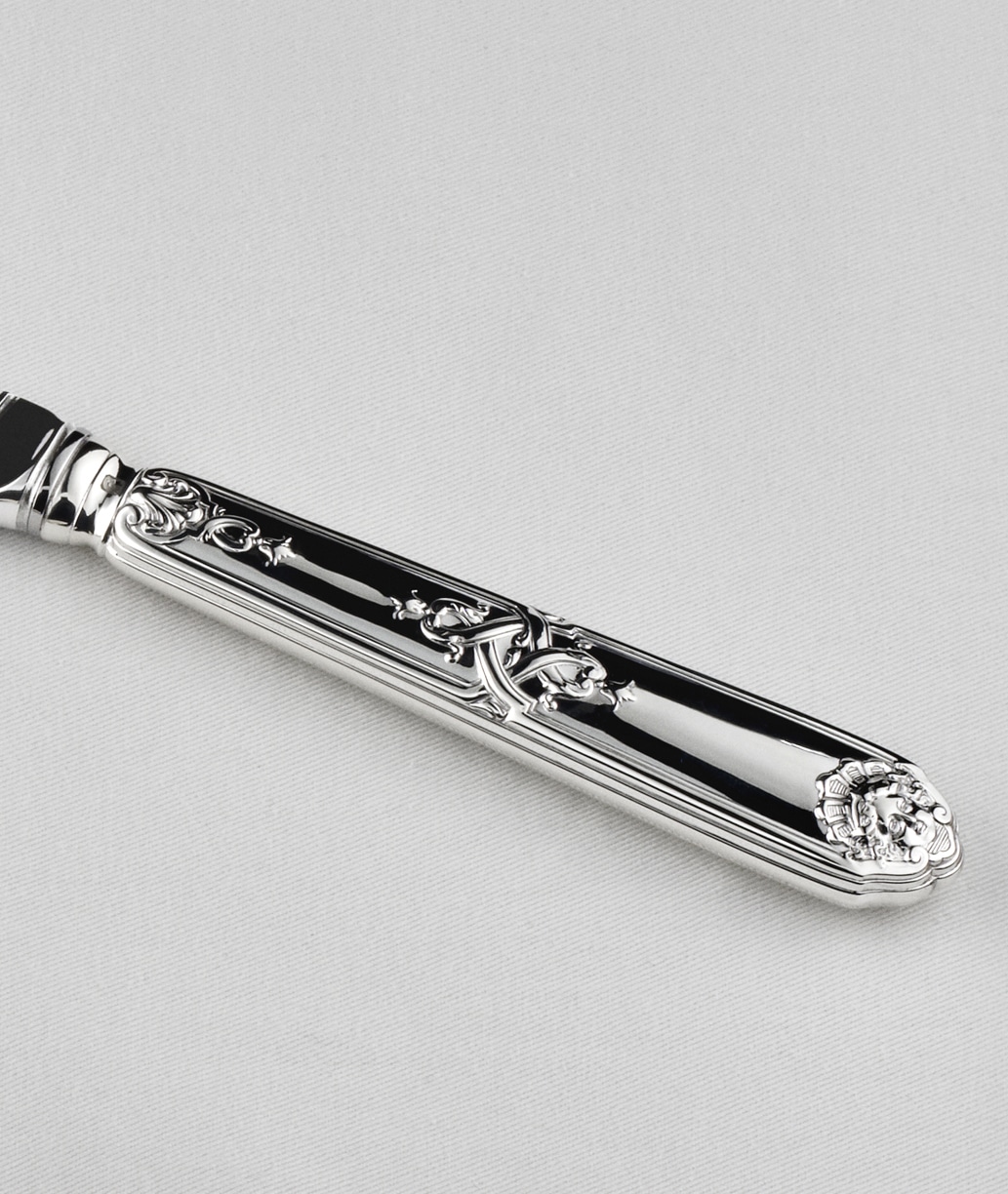 Details of a piece of cutlery in sterling silver from Molière Mascaron collection from Puiforcat