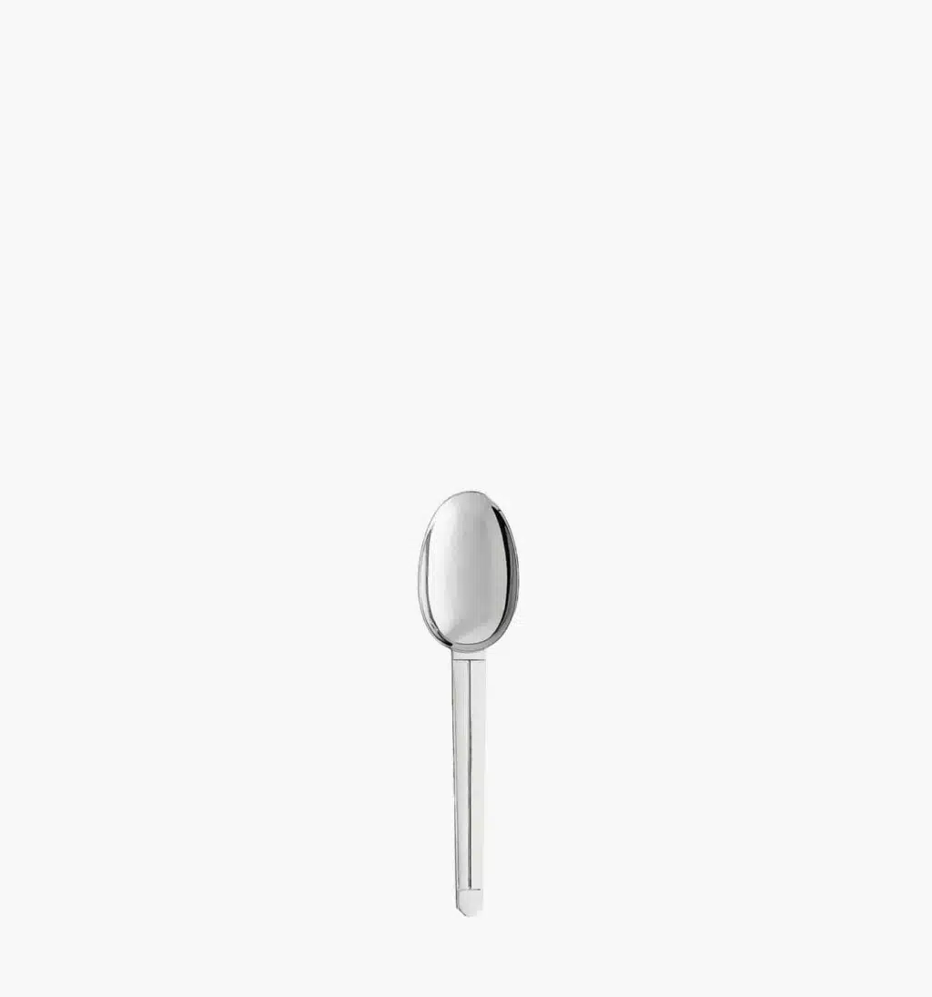 Demitasse spoon in stainless steel from the Guethary collection by Puiforcat on a light background.