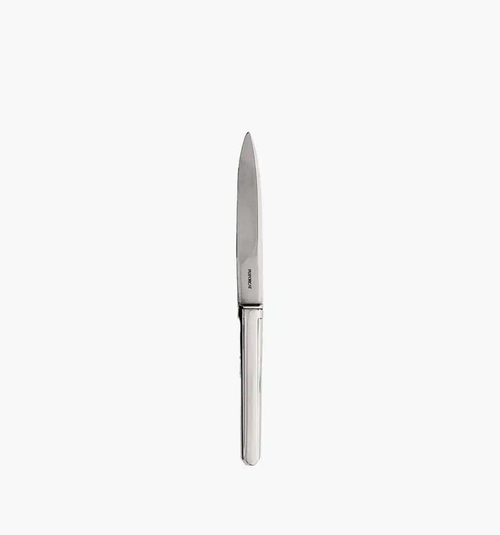 Dessert knife in stainless steel from the Guéthary collection by Puiforcat on a light background