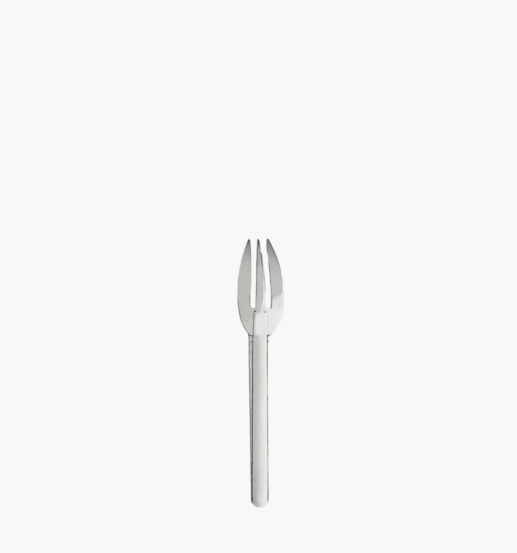 Fish fork in stainless steel from the Guethary by Puiforcat on a light background