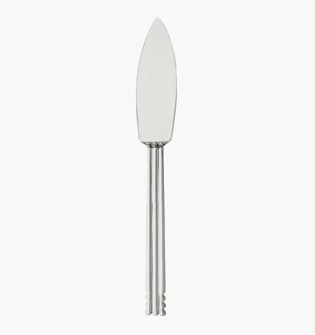 Silver-plated fish knife from the Nantes collection by Puiforcat on a light background.