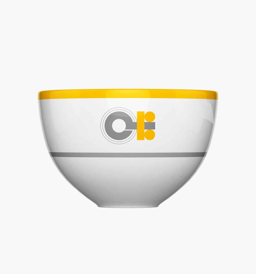 Bol à riz en porcelaine de la collection personnalisable Monogrammes par Puiforcat sur fond clair.